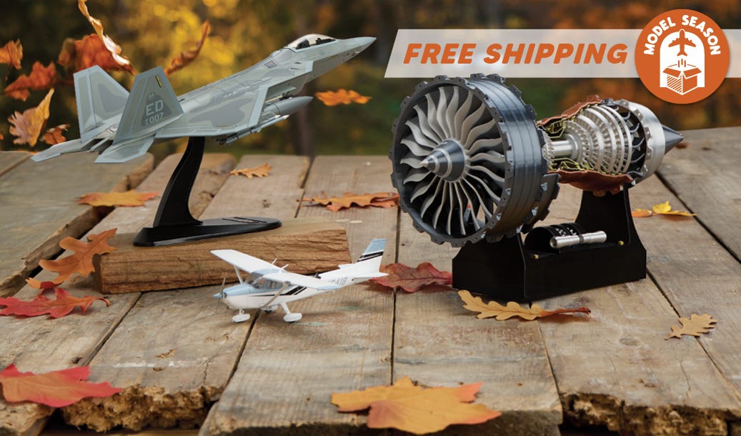 Models of two planes and a turbine engine displayed