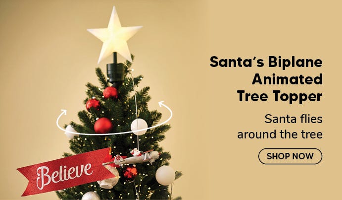 Sant's Biplane Animated Tree Topper on christmas tree