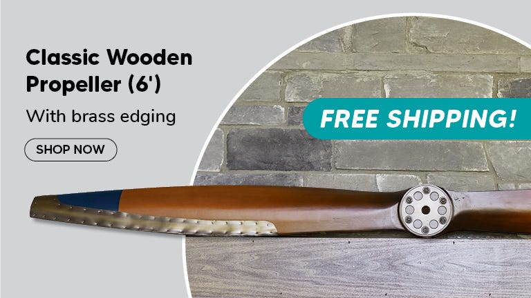 Classic Wooden Propeller sitting on mantle