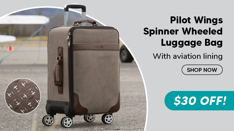 Pilot Wings Spinner Wheeled Bag sitting on runway