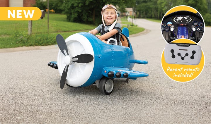 Kid sitting in the Battery Powered Ace Flyer Ride-On for Kids