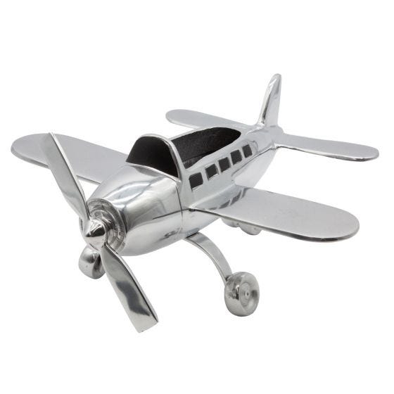 Front  view of polished aluminum airplane organizer on white