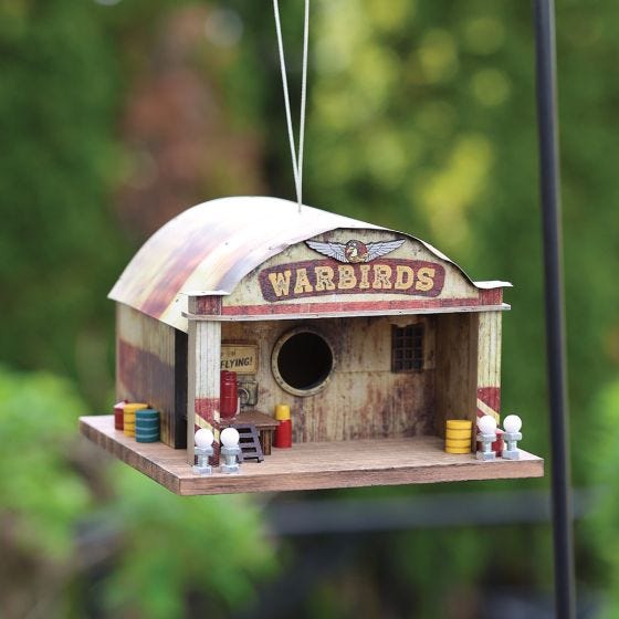 up close view of Warbirds Hangar Birdhouse on hook