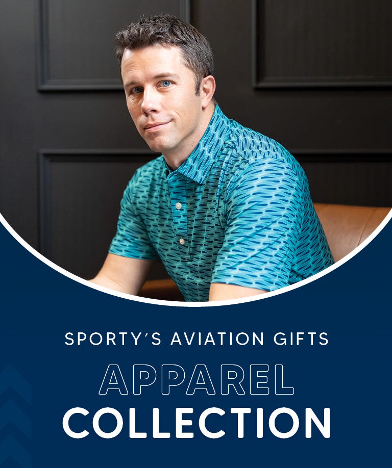 Guy in front of an airplane with a black Aerowear jacket, near Apparel Collection logo