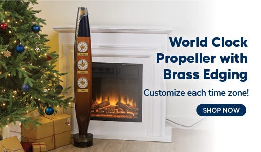 World Clock Propeller with Brass Edging. Customize each time zone! Propeller in home setting by fireplace and christmas Tree. Shop Now.